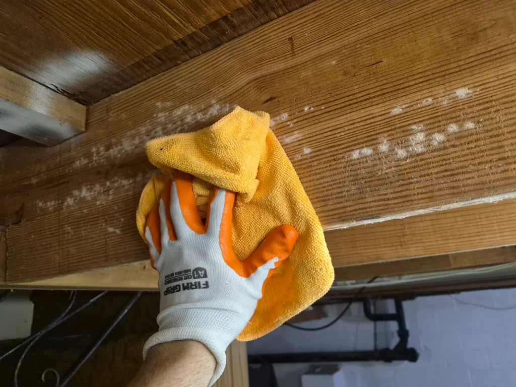 Wooden surface being cleaned in Bucks County, PA, removing dirt and buildup for a cleaner, brighter, refreshed finish