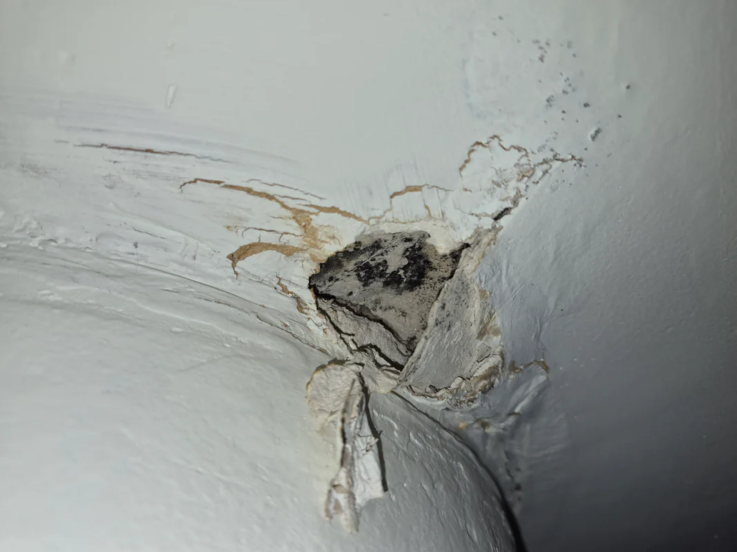 Damaged wall crack in a Bucks County, Pennsylvania home showing visible interior wall damage needing professional repair